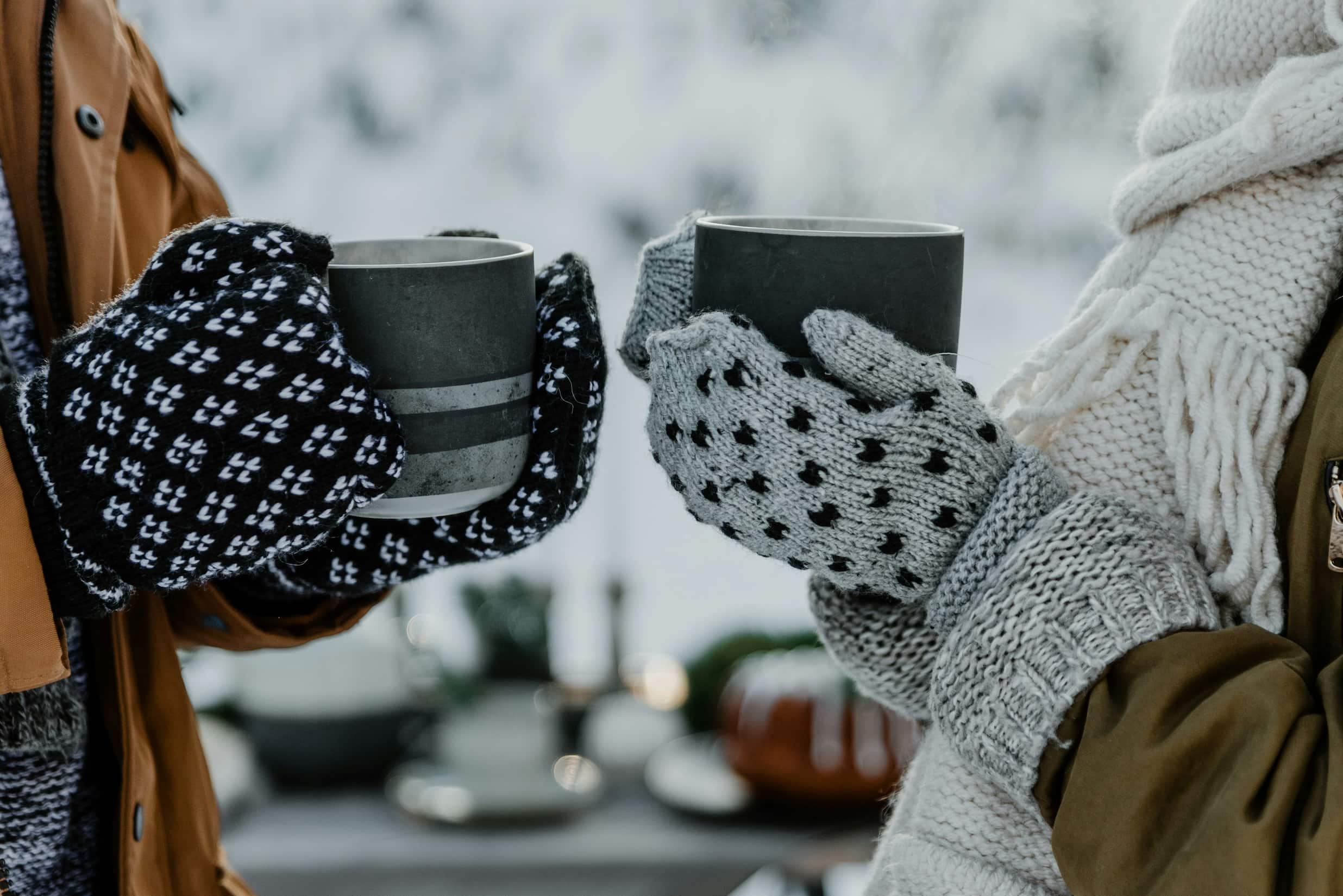 Cold hands being held together for warmth