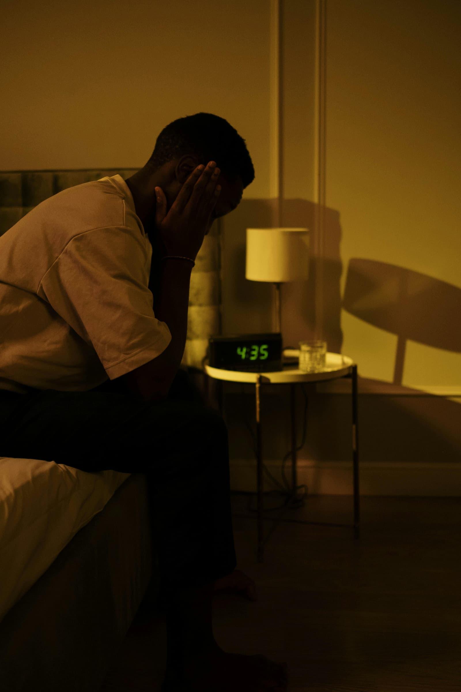Frustrated person unable to sleep